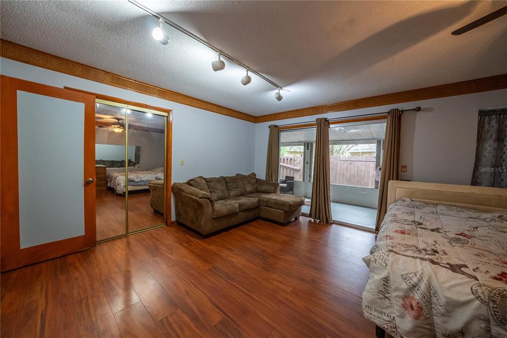 12 Spring Lake Way Ocala, FL 34472 - Photo 35 of 57 a living room with furniture and a large window