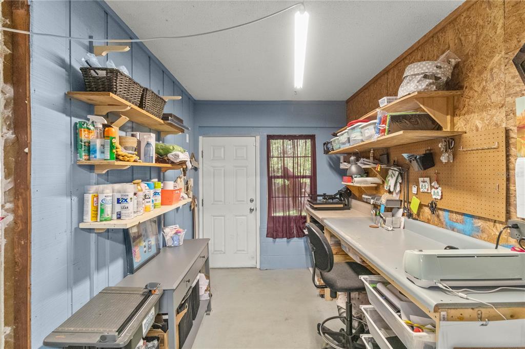 12 Spring Lake Way Ocala, FL 34472 - Photo 42 of 57 a room with stainless steel appliances kitchen island granite countertop lots of clutter and stainless steel appliances