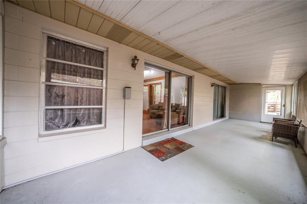 12 Spring Lake Way Ocala, FL 34472 - Photo 44 of 57 a living room with furniture and a window