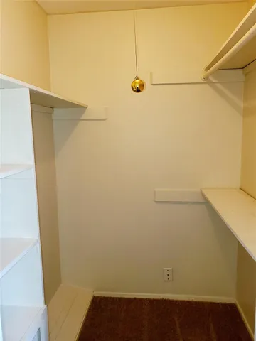 a view of small space with empty racks