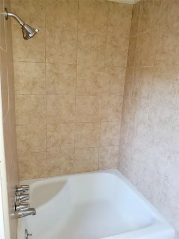 a bathroom with a bathtub