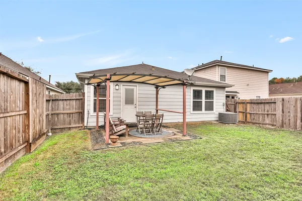 a outdoor space with a couches and chairs