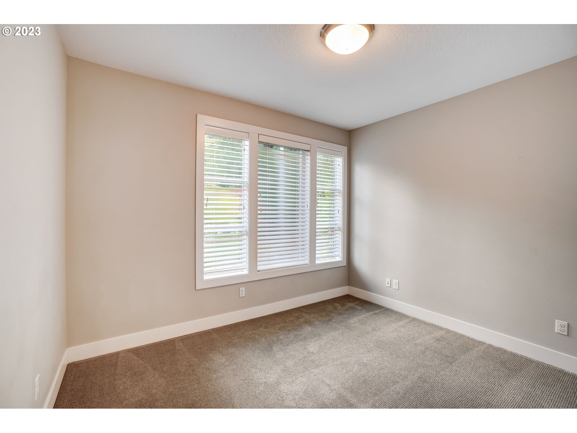 548 Southwest Chinook Terrace Portland, OR 97225 - Photo 18 of 44 a view of an empty room with a window