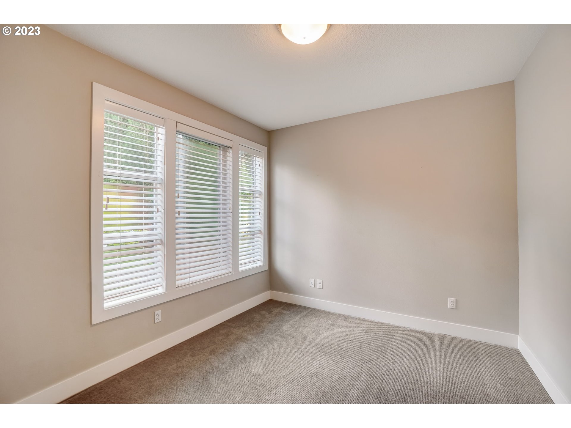 548 Southwest Chinook Terrace Portland, OR 97225 - Photo 19 of 44 a view of an empty room with a window
