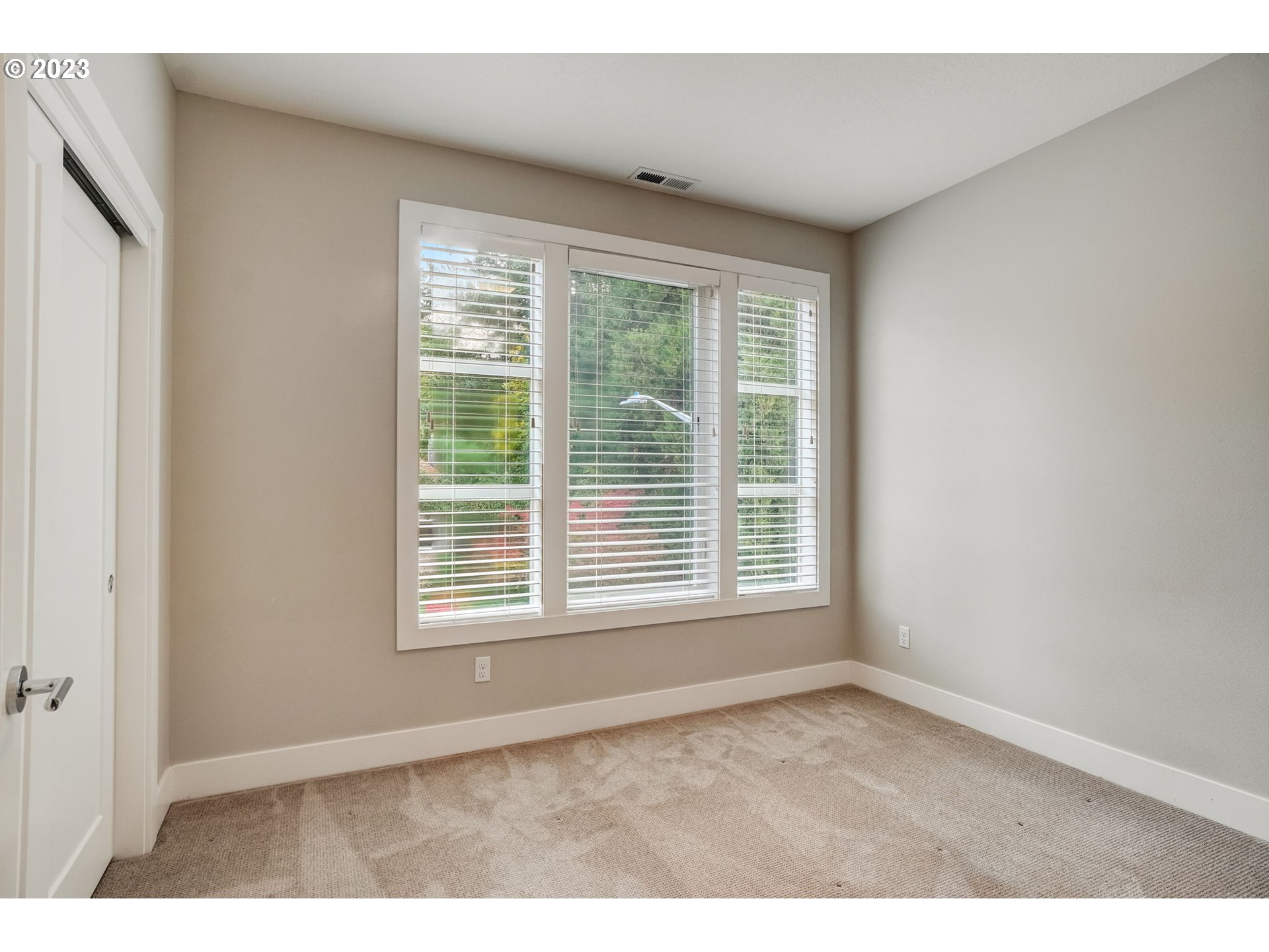 548 Southwest Chinook Terrace Portland, OR 97225 - Photo 23 of 44 a view of an empty room with a window