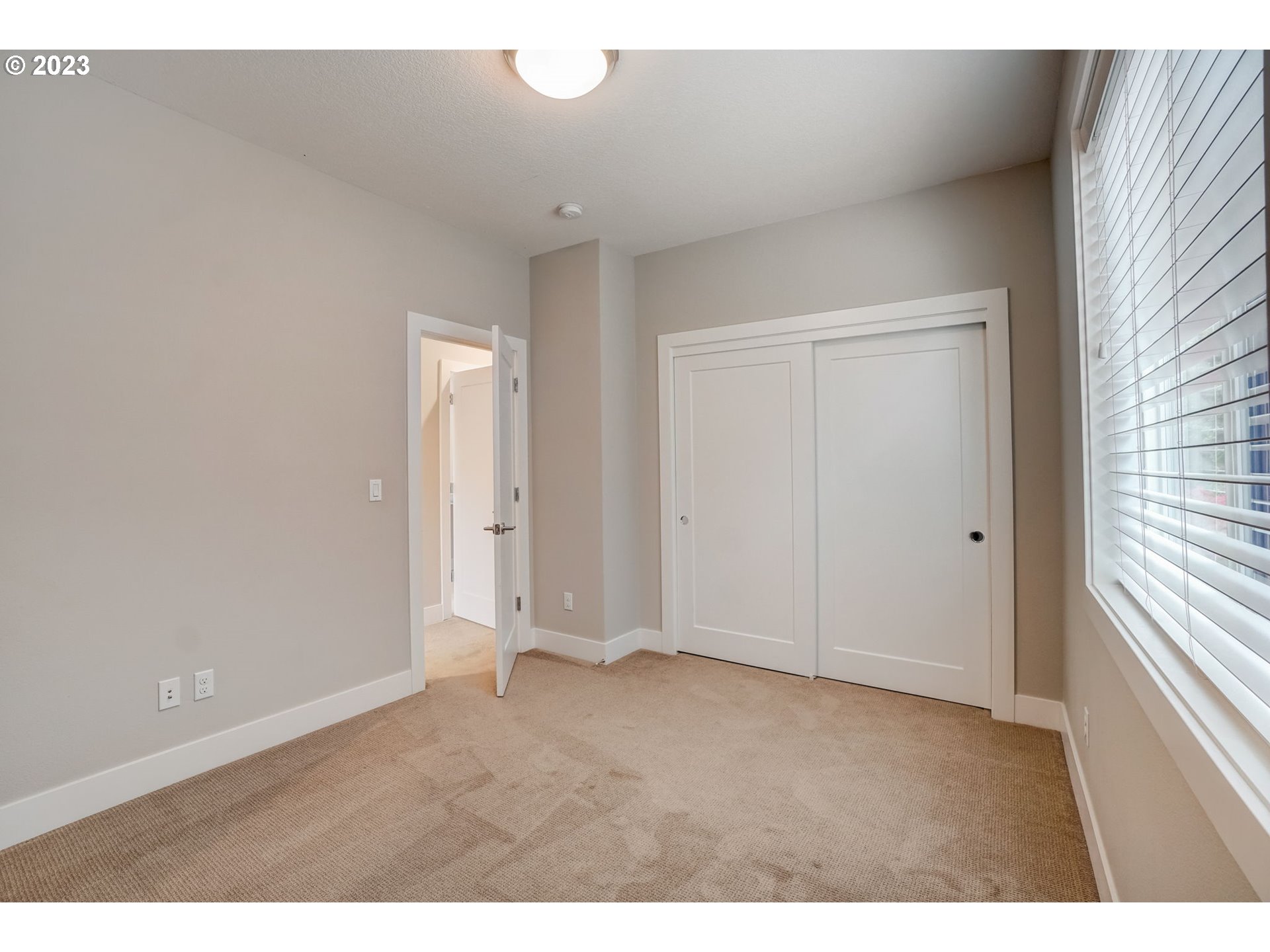 548 Southwest Chinook Terrace Portland, OR 97225 - Photo 27 of 44 a view of an empty room and window