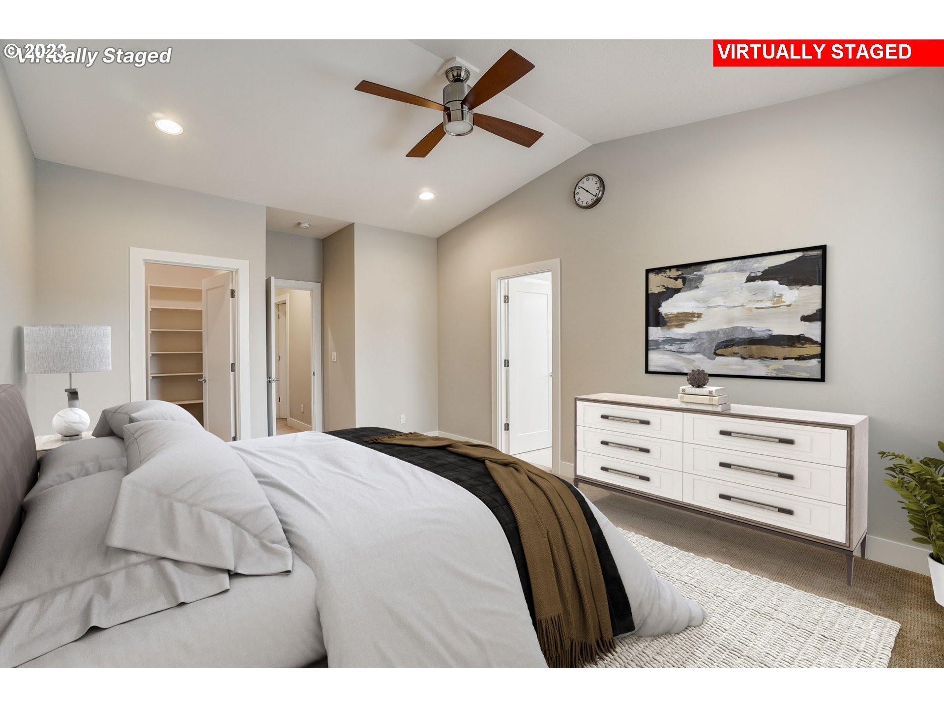 548 Southwest Chinook Terrace Portland, OR 97225 - Photo 31 of 44 a bedroom with a bed and a painting on the wall