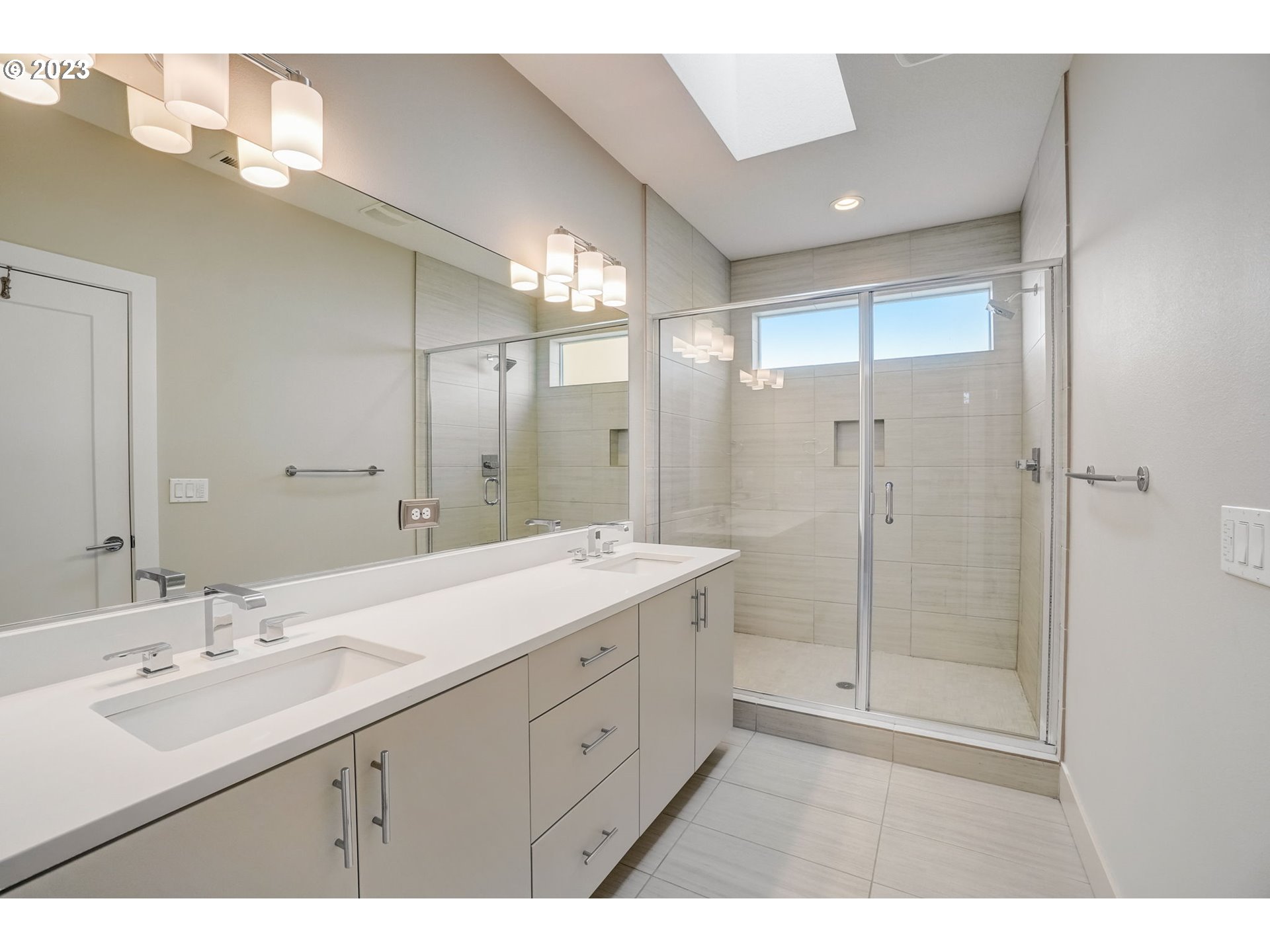 548 Southwest Chinook Terrace Portland, OR 97225 - Photo 33 of 44 a bathroom with a double vanity sink mirror and double