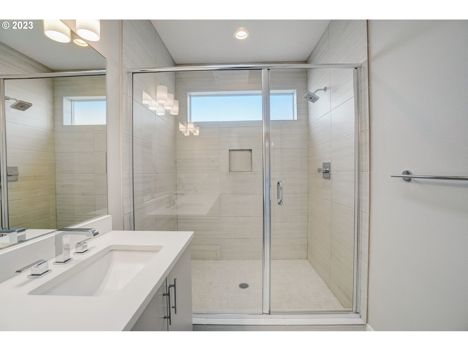 548 Southwest Chinook Terrace Portland, OR 97225 - Photo 34 of 44 a bathroom with a shower sink and mirror