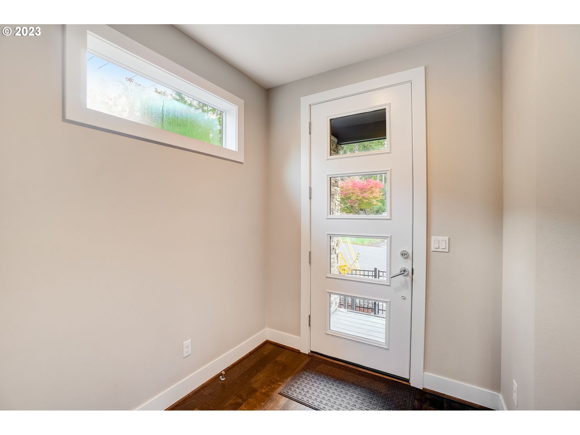 548 Southwest Chinook Terrace Portland, OR 97225 - Photo 4 of 44 an empty room with windows and dinning room