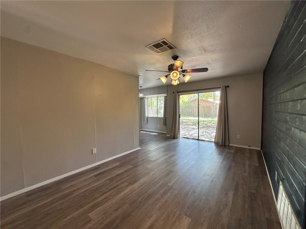 2994 Lovers Lane Ingleside, TX 78362 - Photo 13 of 39 wooden floor in an empty room with a window