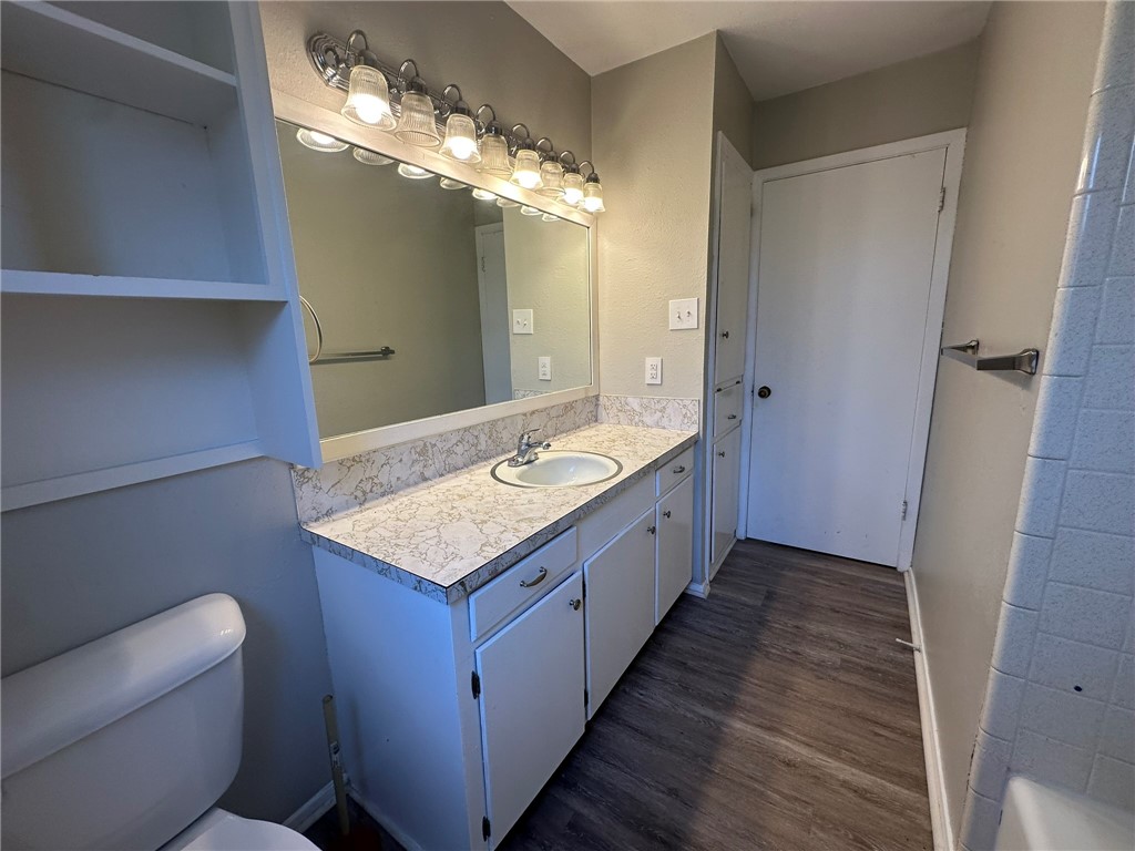 2994 Lovers Lane Ingleside, TX 78362 - Photo 36 of 39 a bathroom with a double vanity sink and a mirror