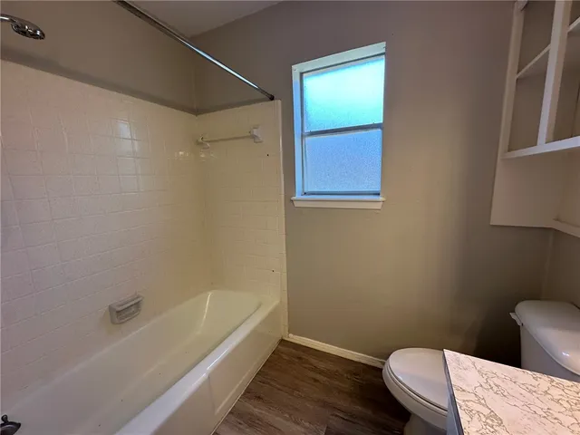 a bathroom with a sink and a toilet