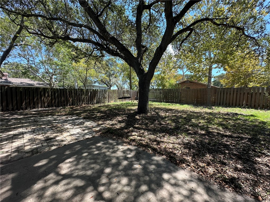 2994 Lovers Lane Ingleside, TX 78362 - Photo 39 of 39 a backyard of a house with lots of green space