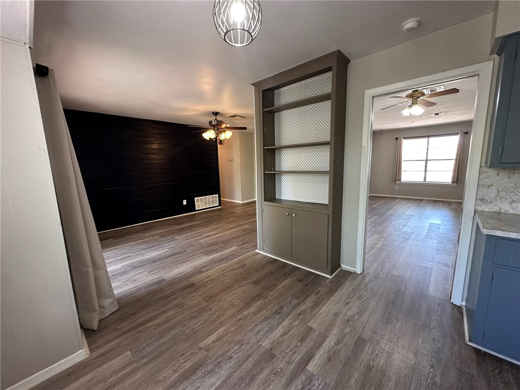 2994 Lovers Lane Ingleside, TX 78362 - Photo 10 of 39 a view of empty room with wooden floor and fan