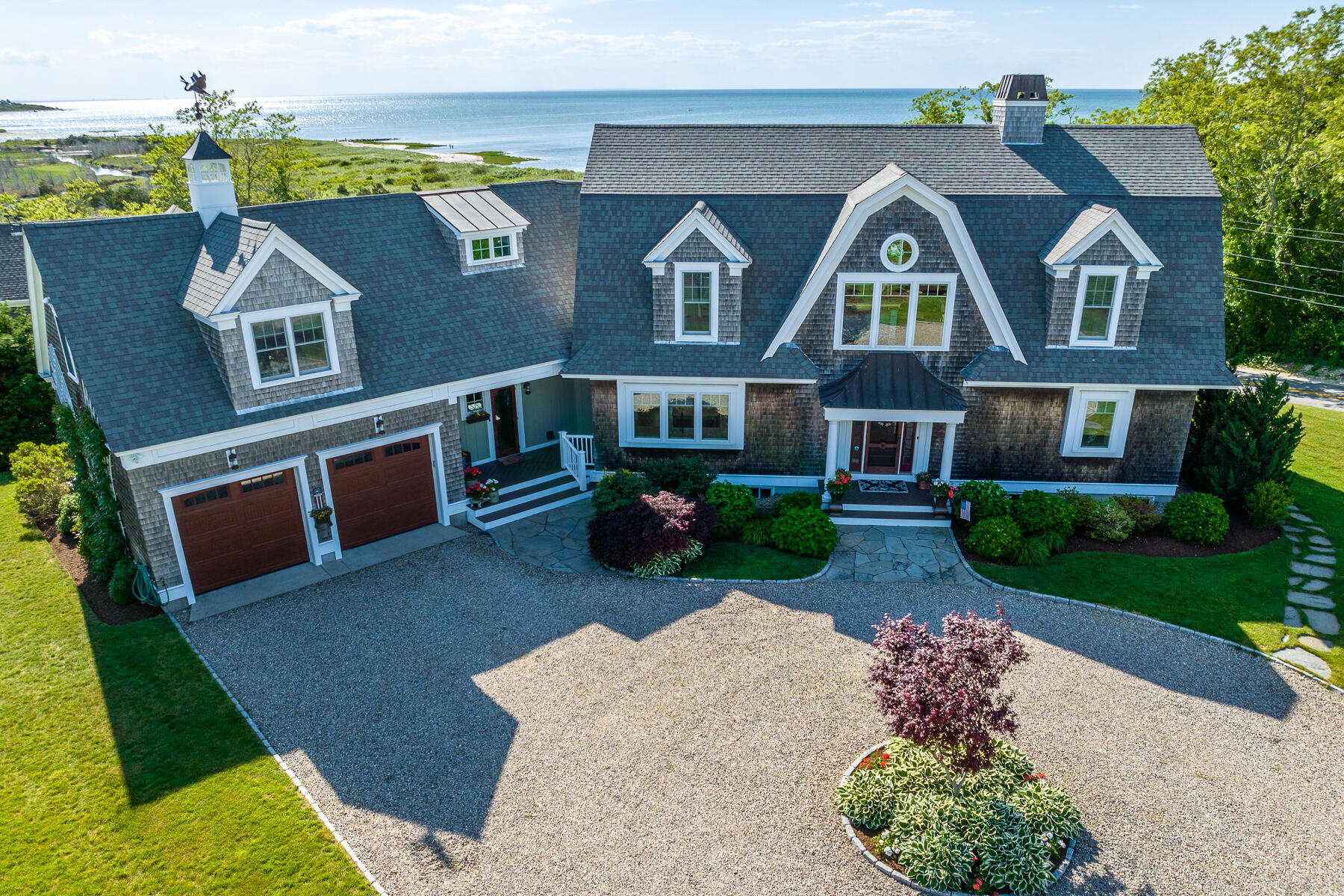 345 Robbins Hill Road Brewster, MA 02631 - Photo 15 of 95 a front view of house with yard