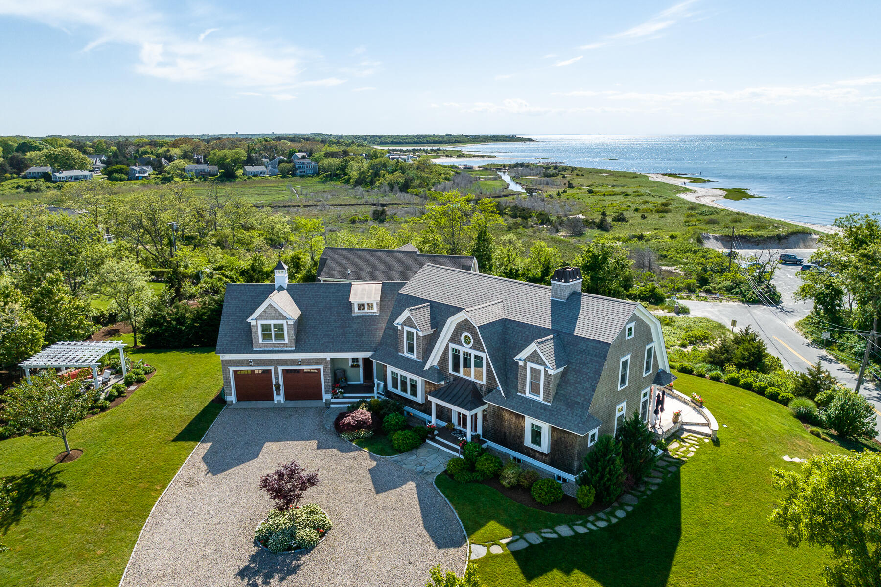 345 Robbins Hill Road Brewster, MA 02631 - Photo 2 of 95 an aerial view of a house with a garden