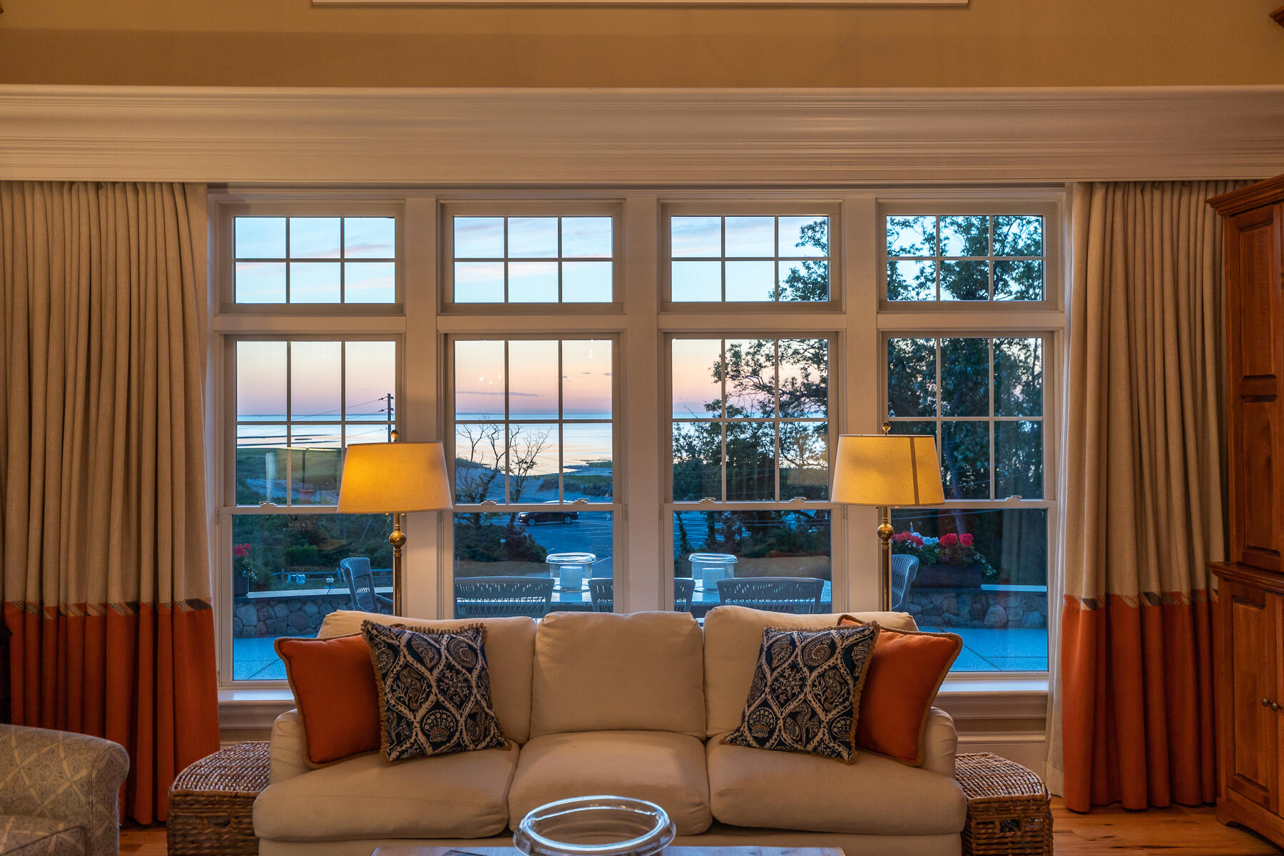 345 Robbins Hill Road Brewster, MA 02631 - Photo 34 of 95 a living room with furniture and a lamp