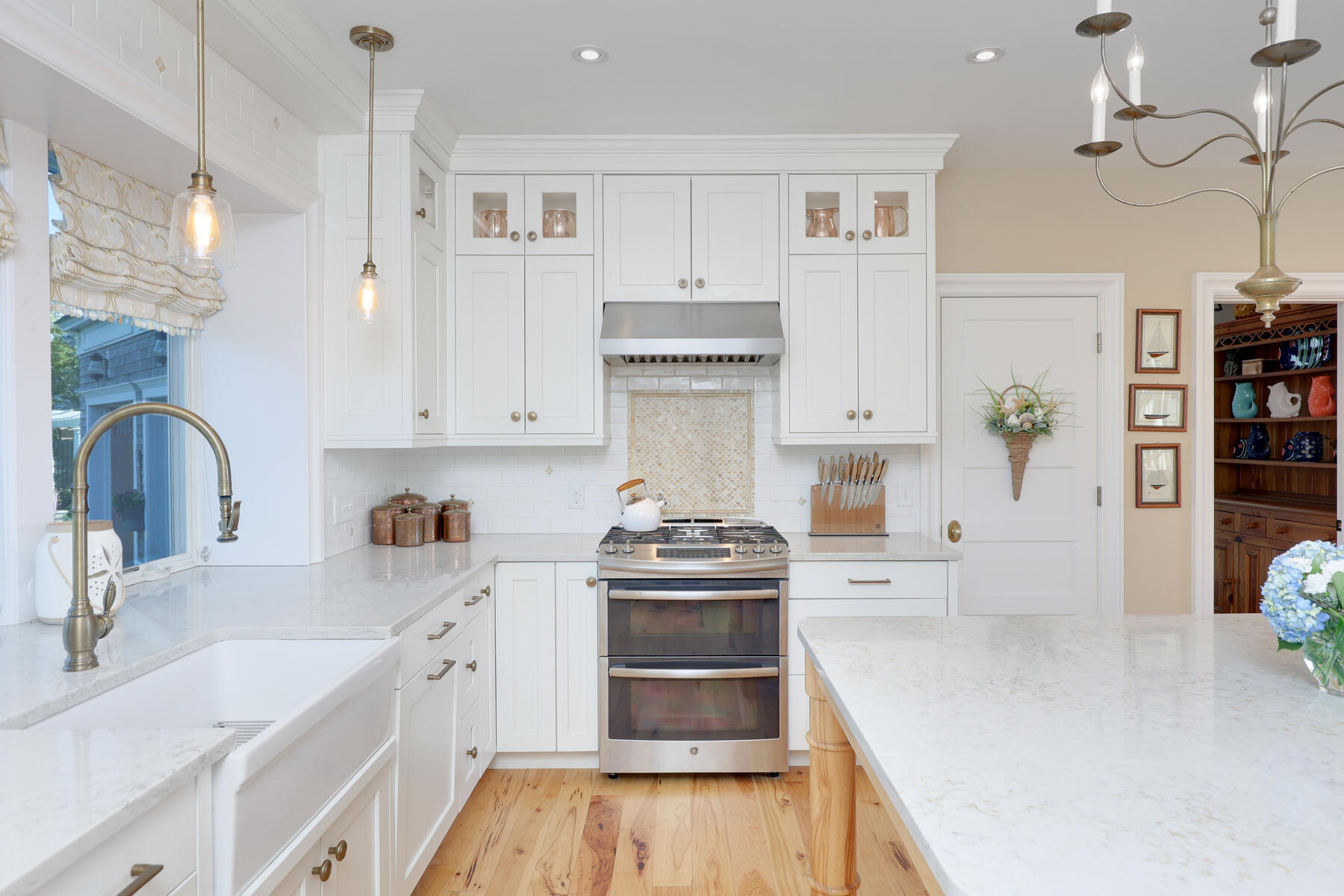 345 Robbins Hill Road Brewster, MA 02631 - Photo 44 of 95 a kitchen with stainless steel appliances granite countertop a stove and a sink