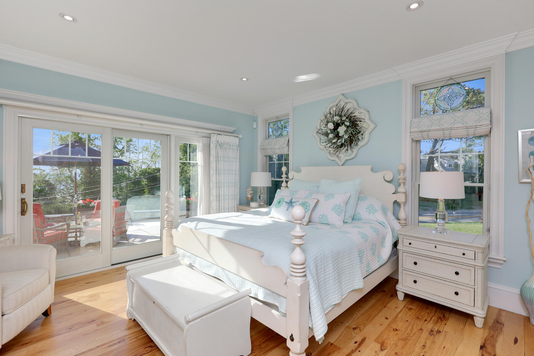 345 Robbins Hill Road Brewster, MA 02631 - Photo 50 of 95 a bedroom with a large bed and a large window