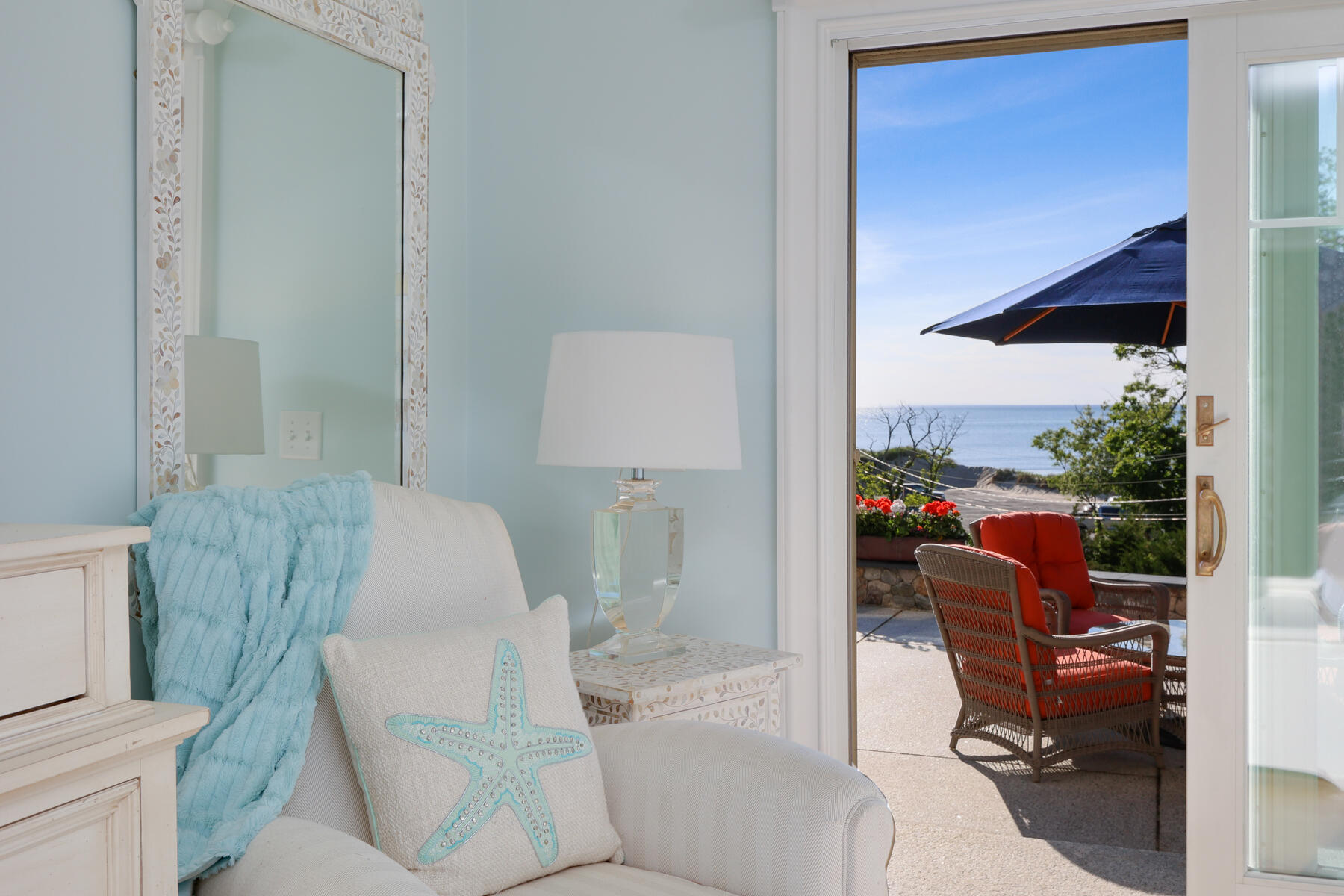 345 Robbins Hill Road Brewster, MA 02631 - Photo 53 of 95 a living room with furniture and a potted plant