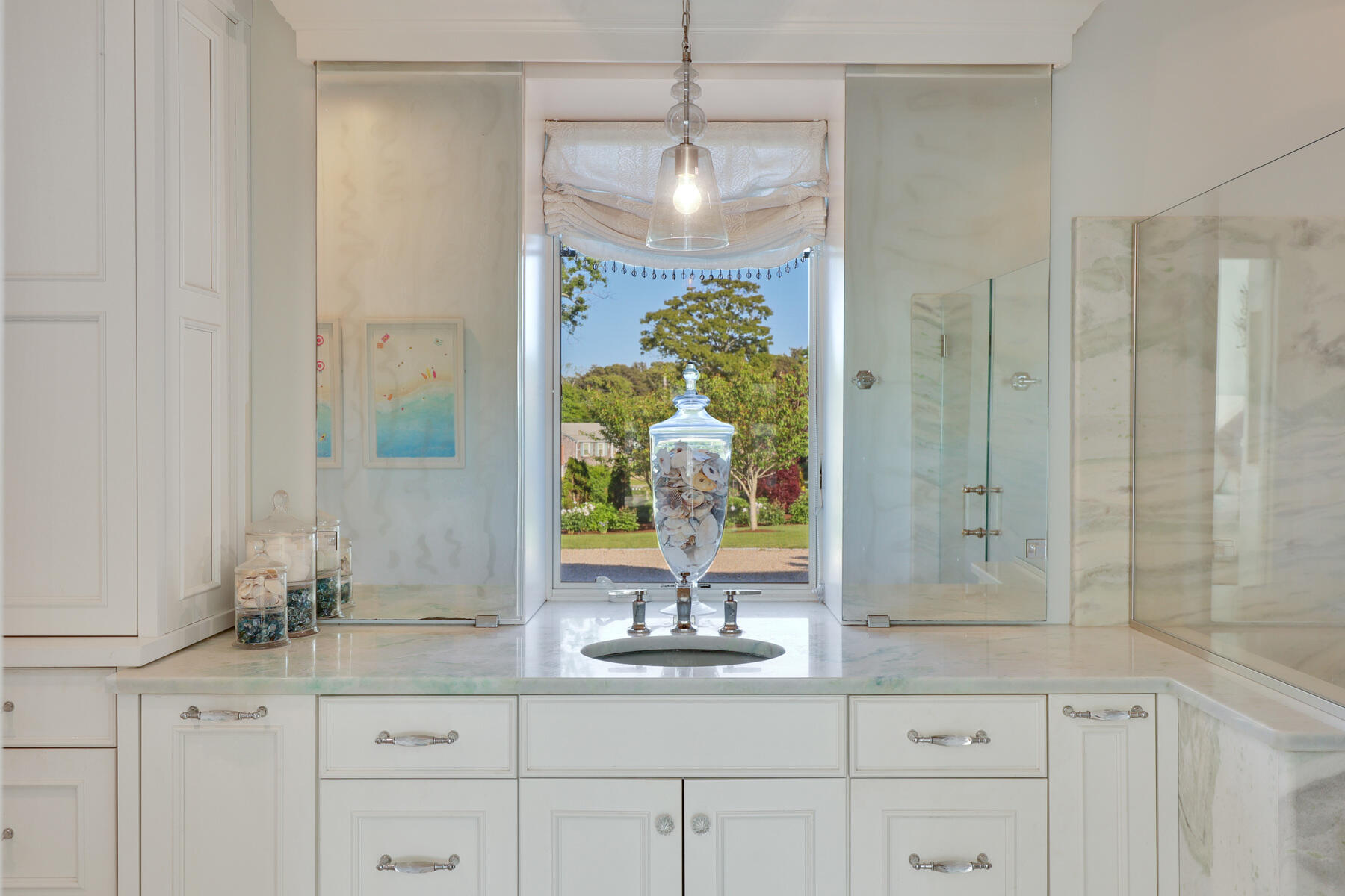 345 Robbins Hill Road Brewster, MA 02631 - Photo 55 of 95 a bathroom with a granite countertop sink a mirror and shower