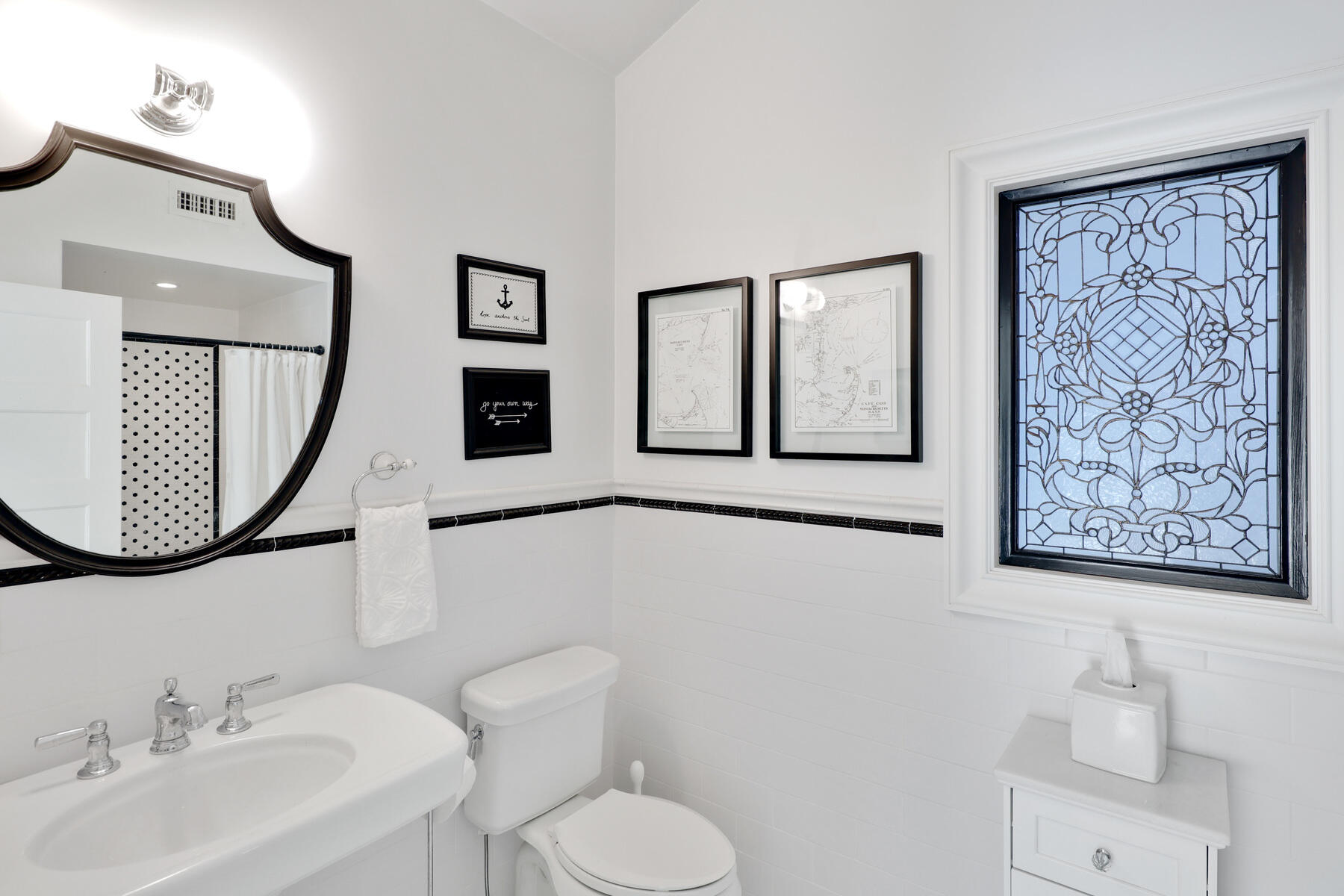 345 Robbins Hill Road Brewster, MA 02631 - Photo 82 of 95 a bathroom with a toilet sink and mirror