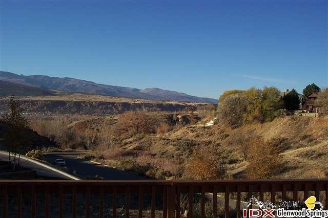 650 Moki Avenue Rifle, CO 81650 - Photo 3 of 4 a view of a balcony with a yard