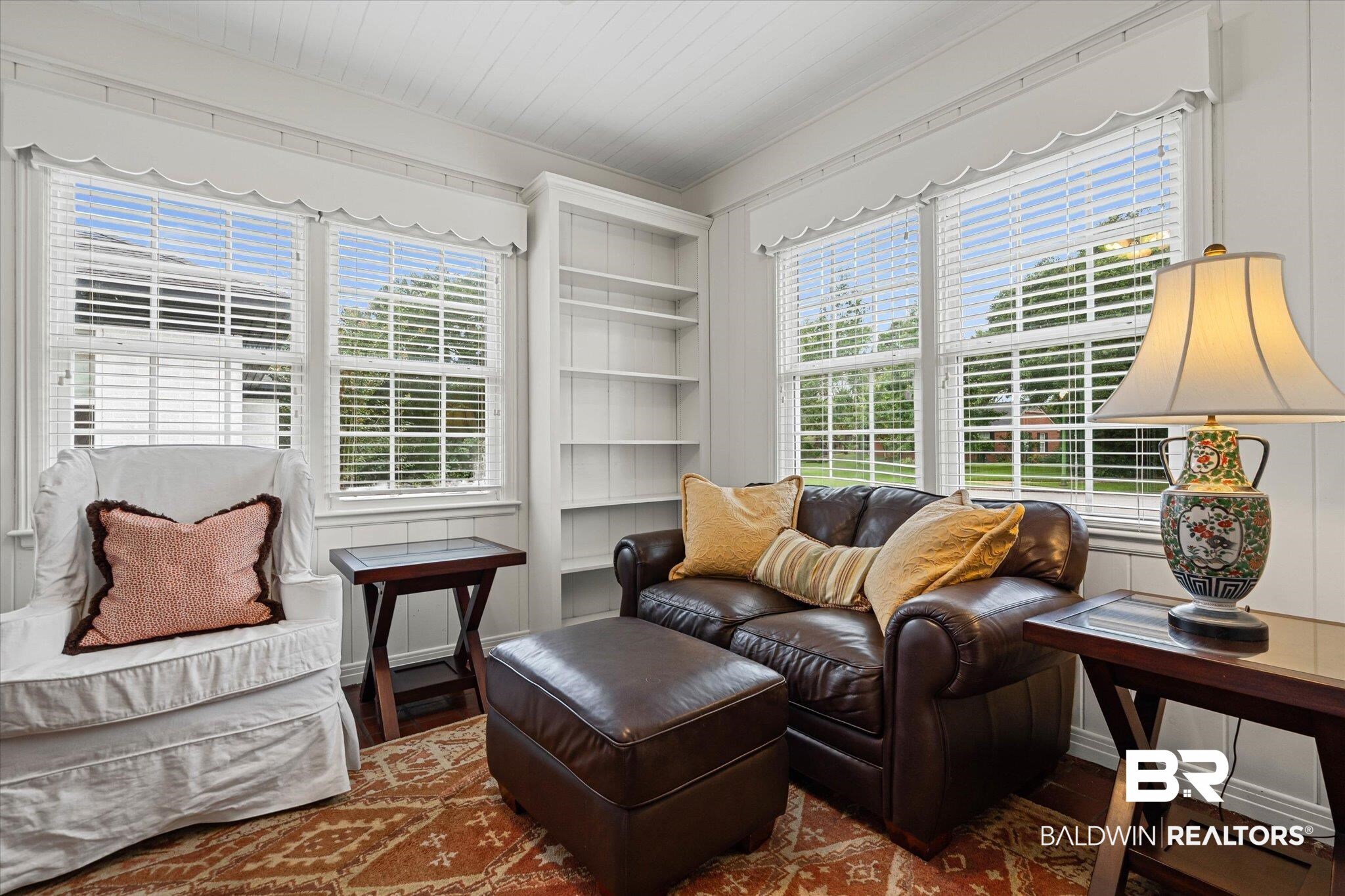 300 Woodlands Avenue Mobile, AL 36607 - Photo 3 of 23 Sitting room with wood finished floors and built in features