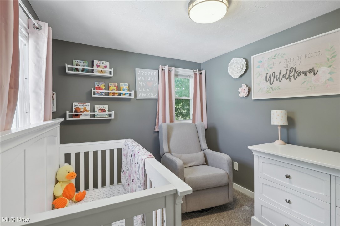 1567 Roselawn Road Cleveland, OH 44124 - Photo 22 of 29 Carpeted bedroom featuring a nursery area