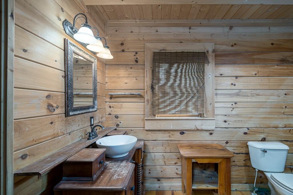 124 Adair Drive Ranger, GA 30734 - Photo 12 of 25 a bathroom with a sink and a toilet