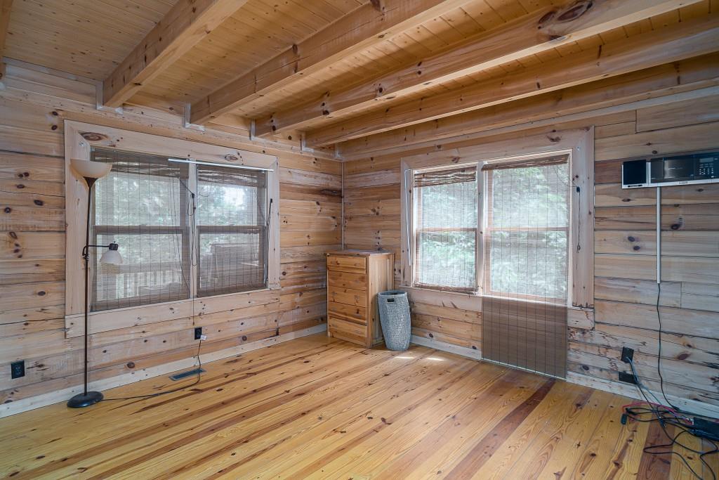 124 Adair Drive Ranger, GA 30734 - Photo 14 of 25 a view of empty room with a fireplace and windows