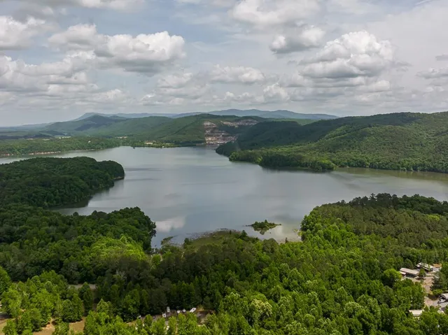 a view of a lake with a yard