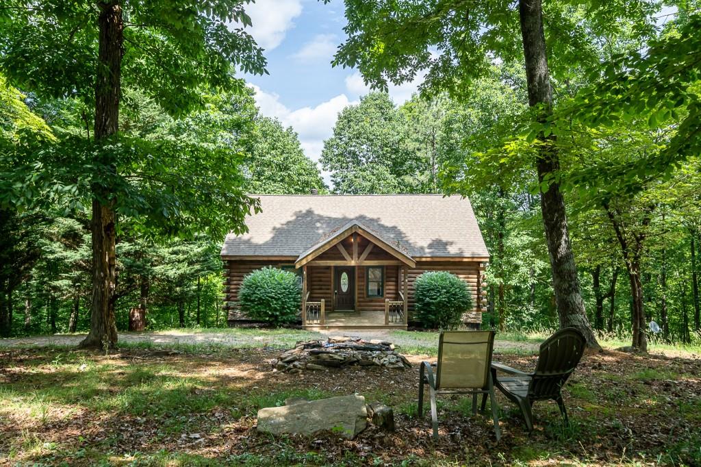 124 Adair Drive Ranger, GA 30734 - Photo 5 of 25 a house view with a garden space