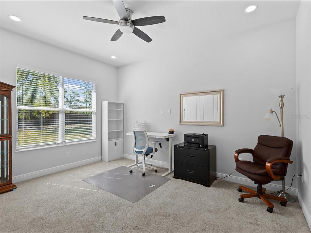 11981 Robina Road Weeki Wachee, FL 34614 - Photo 30 of 93 a workspace with furniture and a window