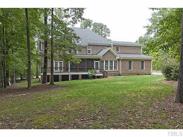 1013 Quiet Ridge Circle Raleigh, NC 27614 - Photo 13 of 15 a front view of a house with a garden
