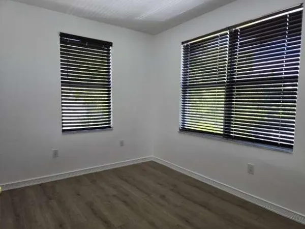 a view of a room that has a window