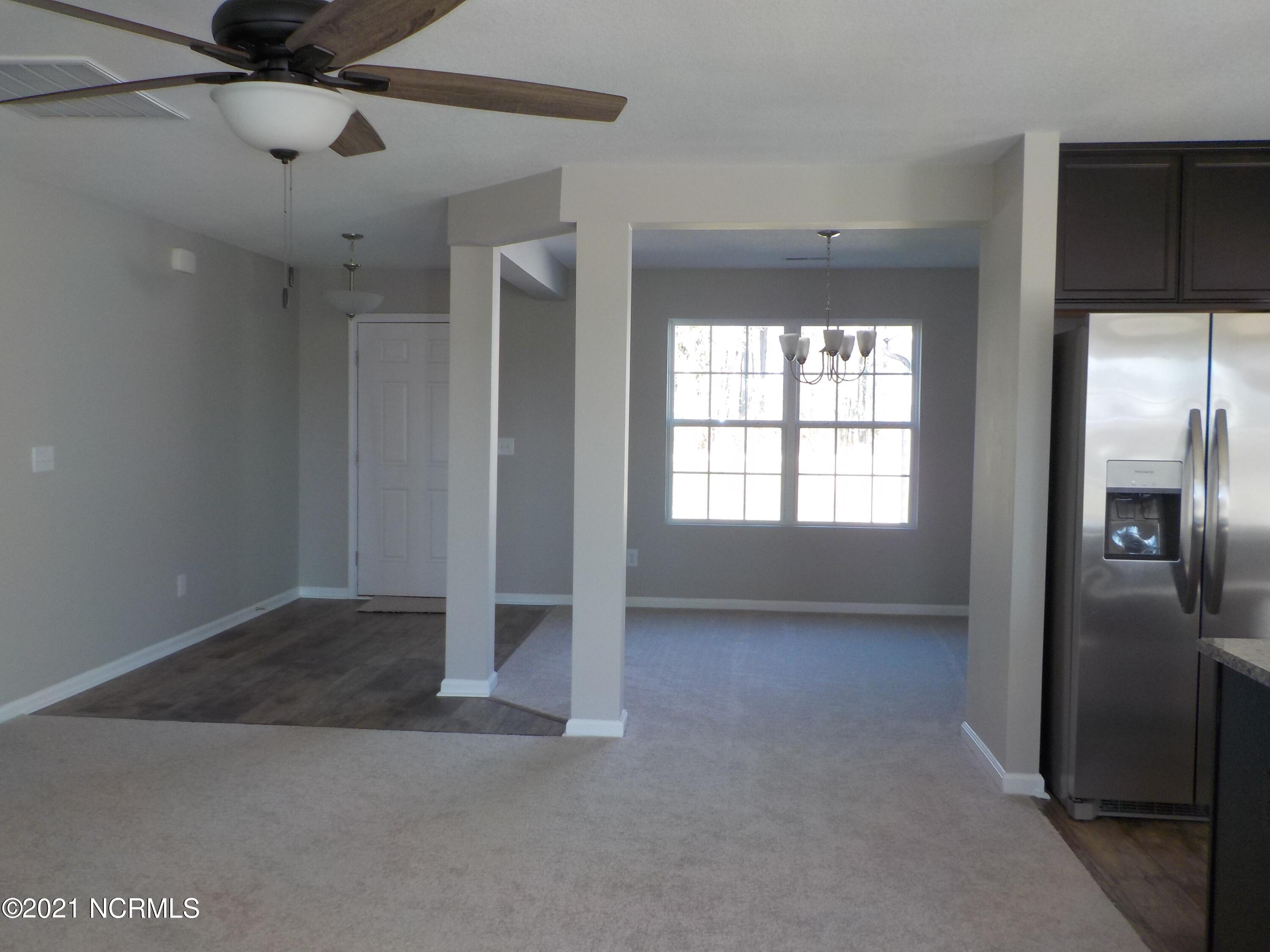 7735 Liles Road Bailey, NC 27807 - Photo 17 of 69 foyer and dining/flex room