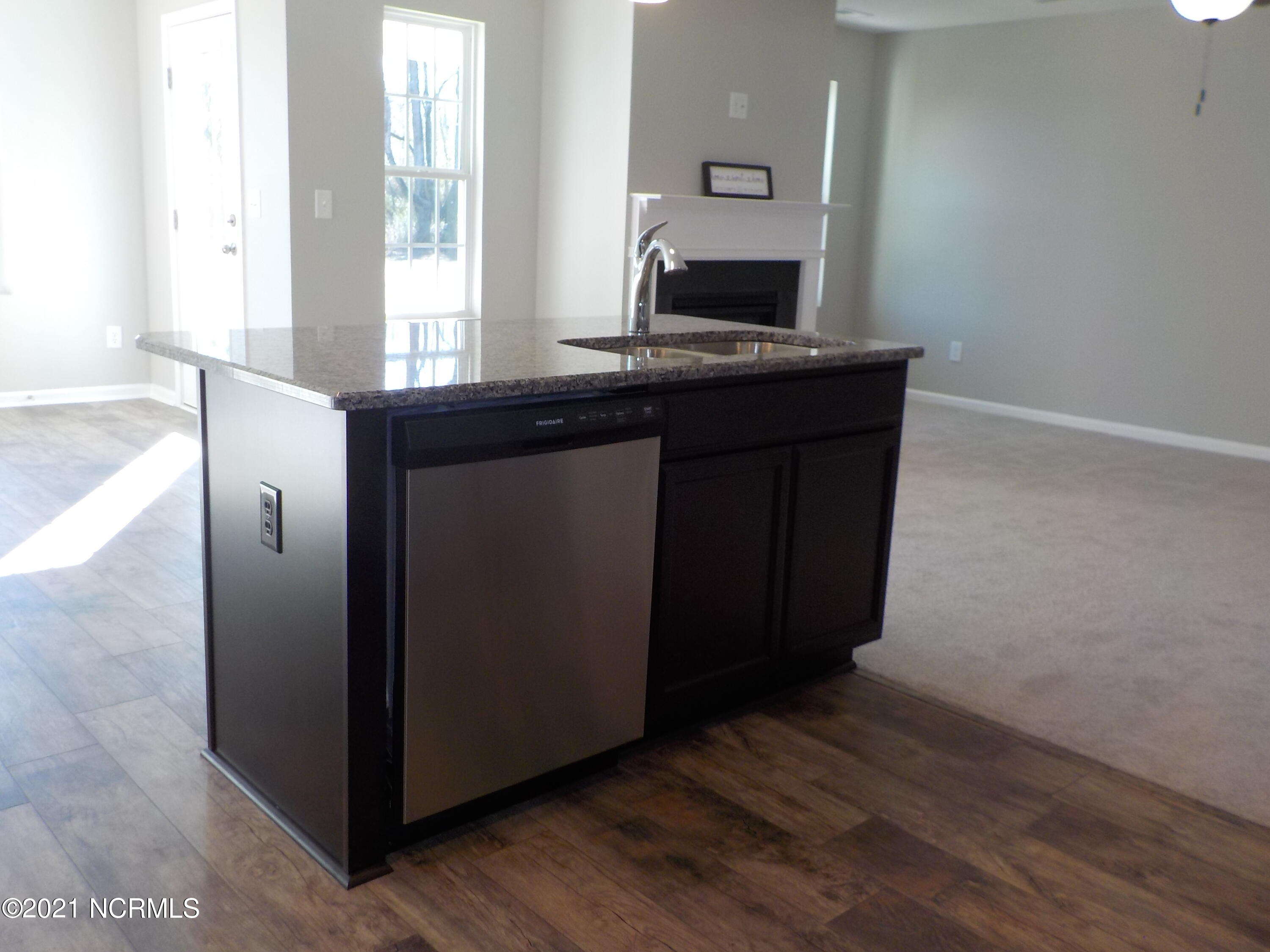 7735 Liles Road Bailey, NC 27807 - Photo 36 of 69 dishwasher built into island