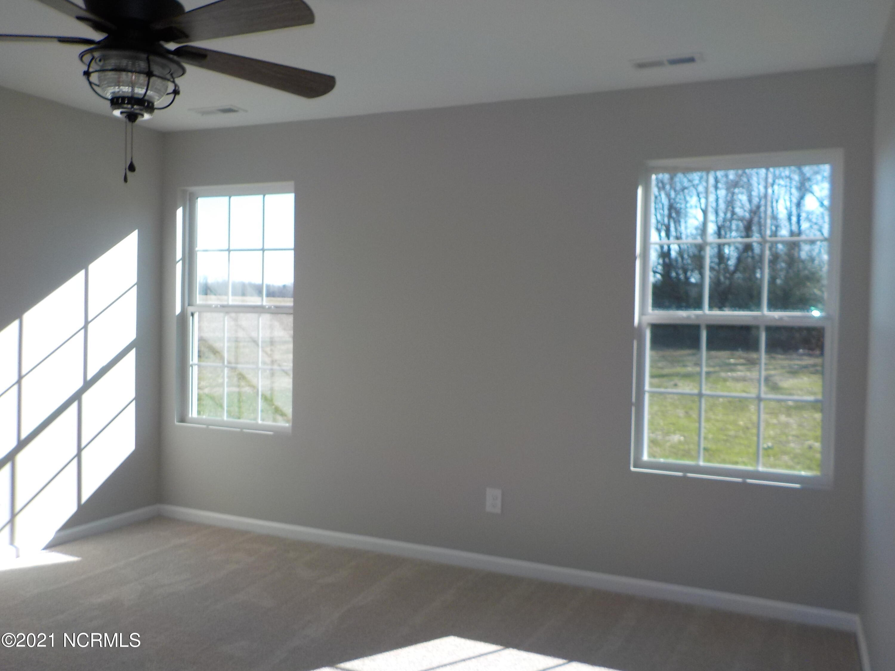 7735 Liles Road Bailey, NC 27807 - Photo 38 of 69 Master bedroom, light and bright