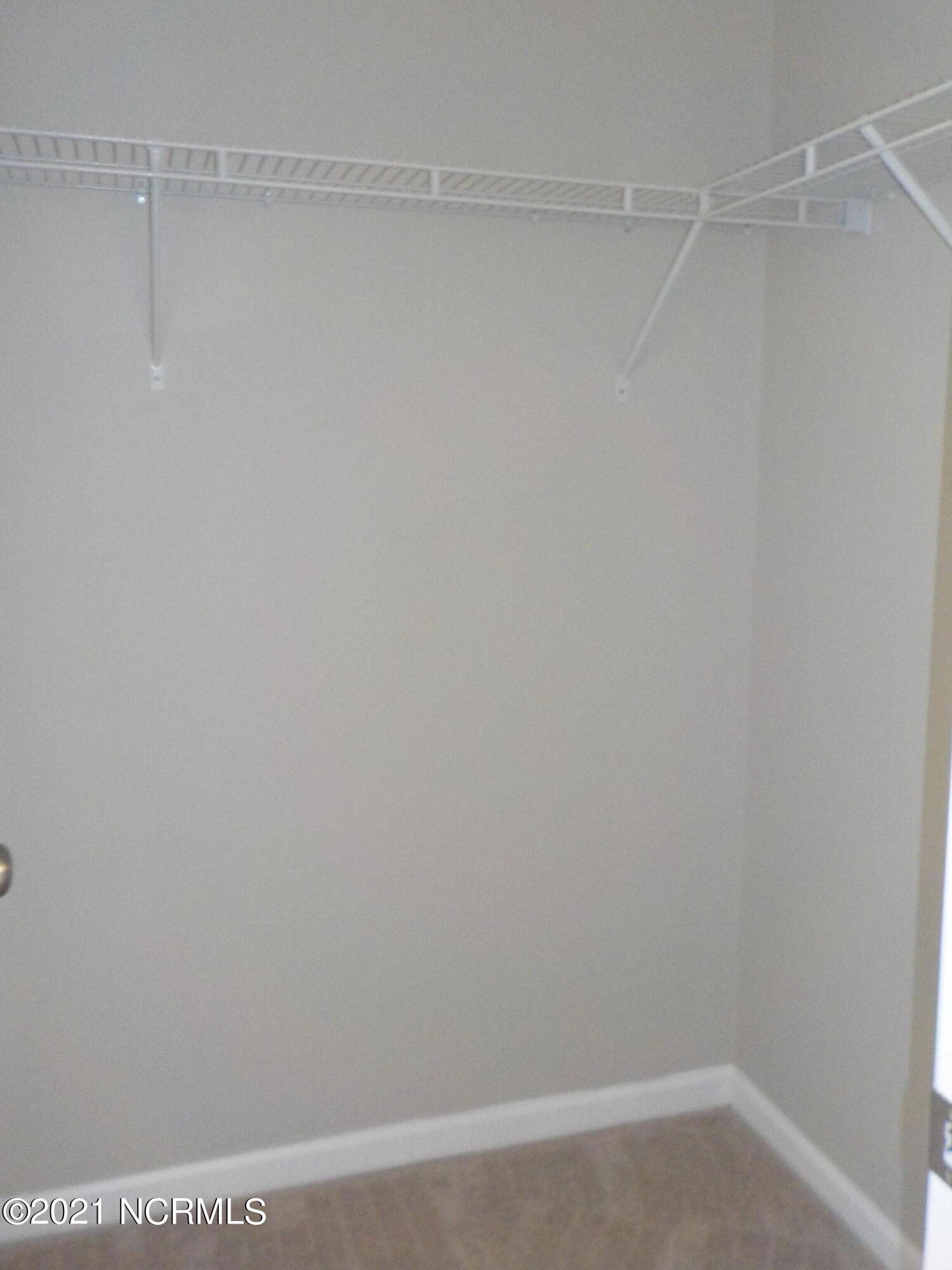 7735 Liles Road Bailey, NC 27807 - Photo 49 of 69 all bedroom closets are walk-in and have wire shelving