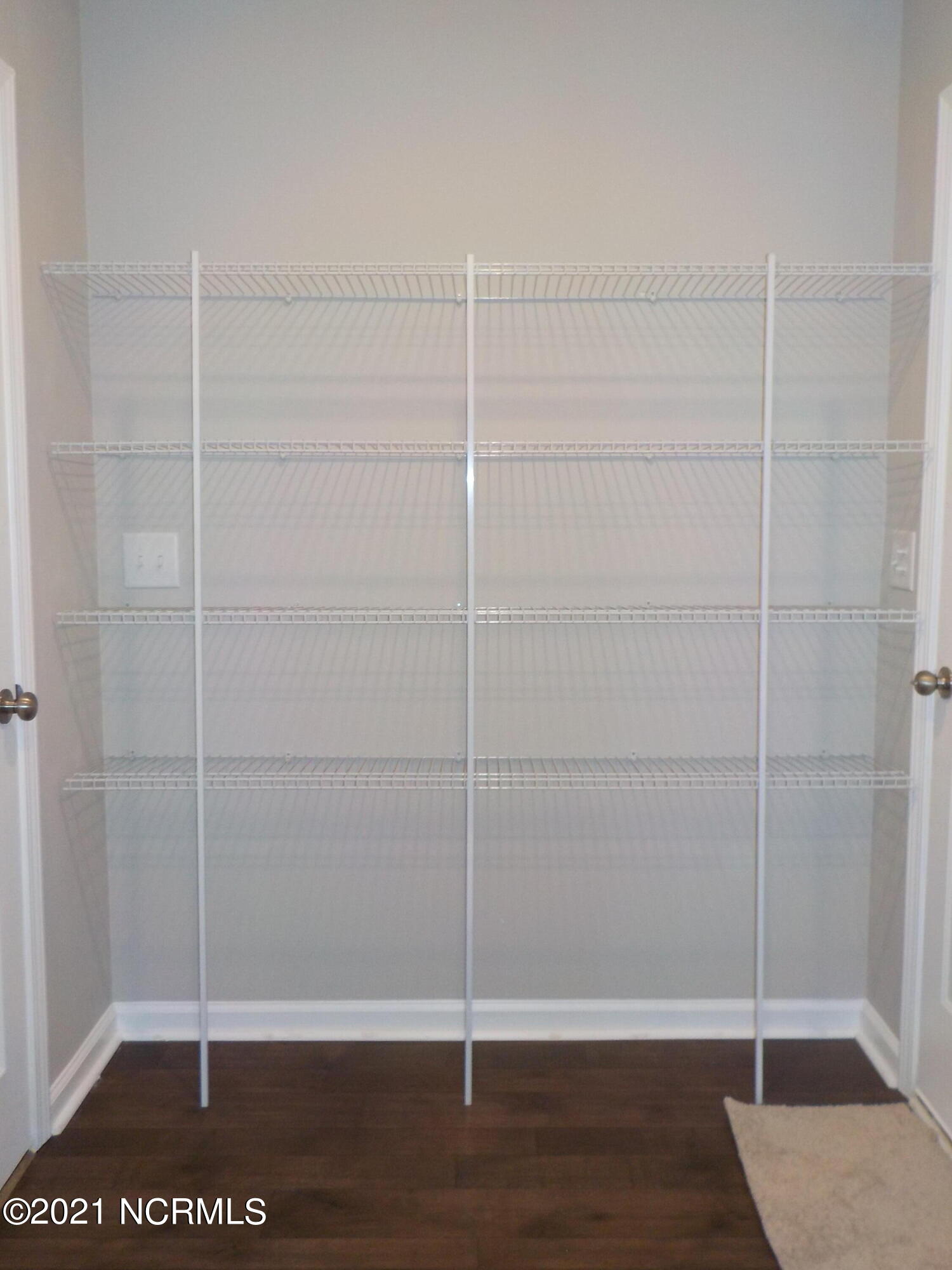 7735 Liles Road Bailey, NC 27807 - Photo 52 of 69 pantry area in utility room with wire shelving
