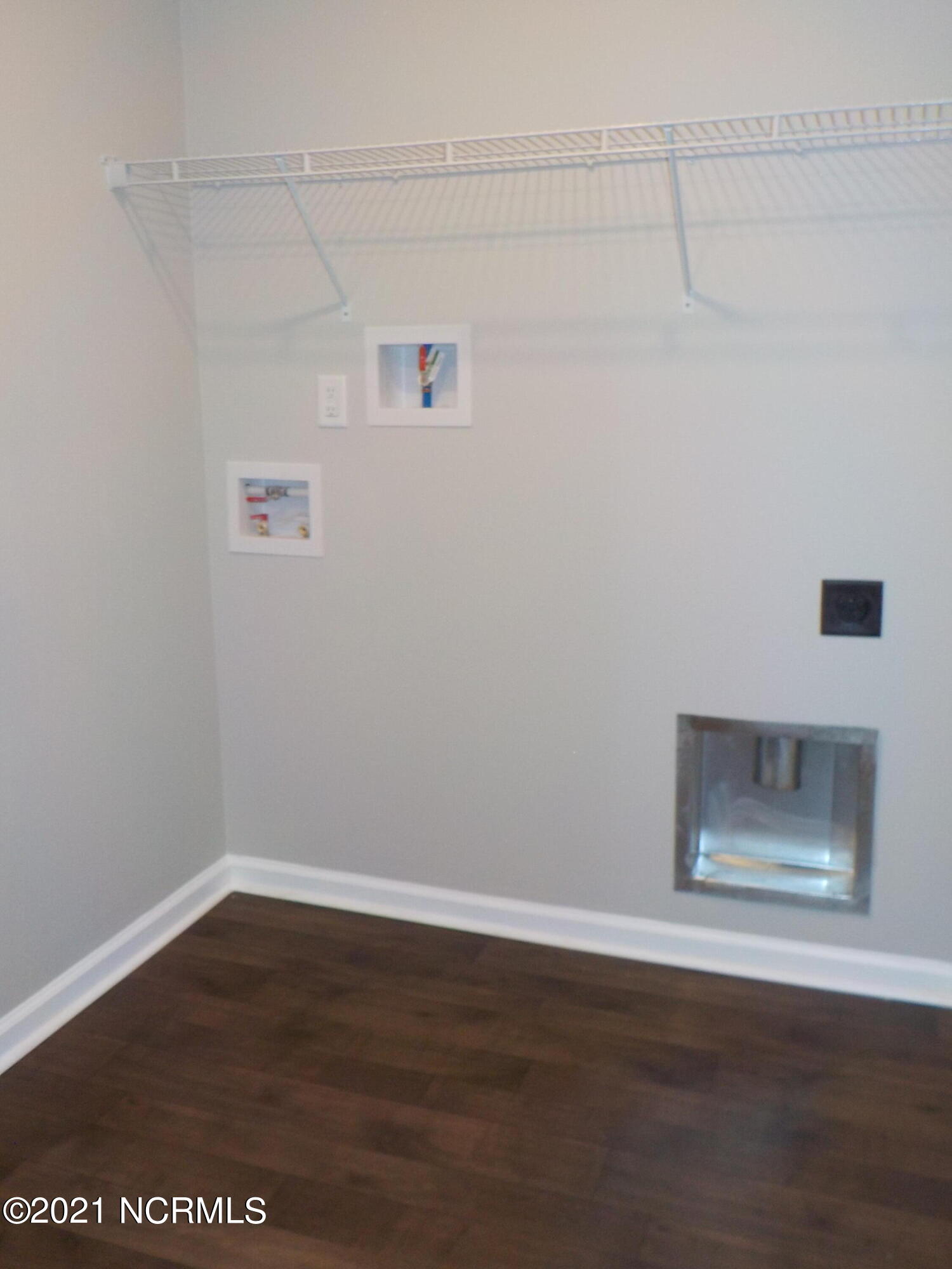 7735 Liles Road Bailey, NC 27807 - Photo 54 of 69 large utility room with wire shelving