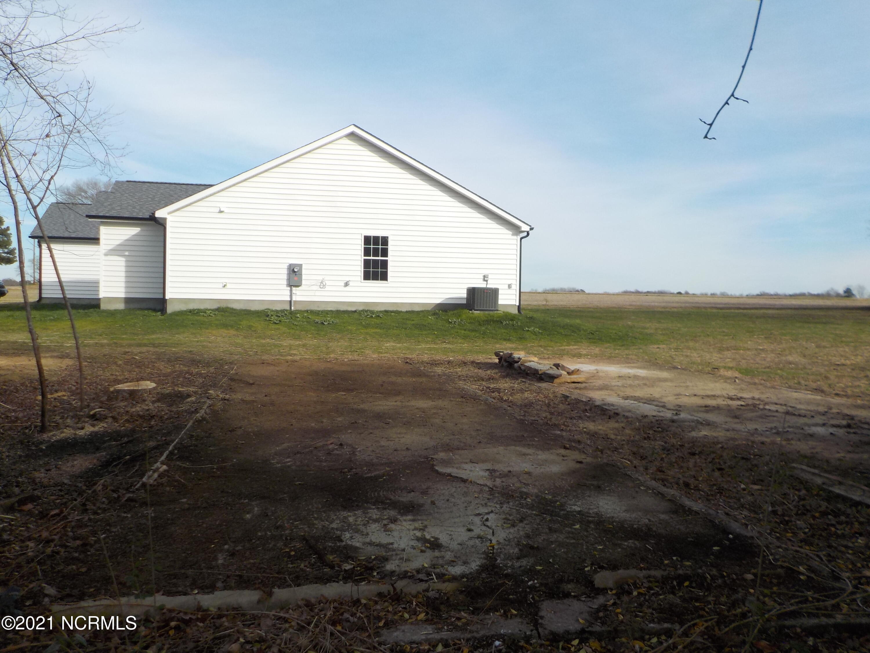 7735 Liles Road Bailey, NC 27807 - Photo 69 of 69 concrete pads from previous structures. Could be used for dog kennel or add storage or workshop