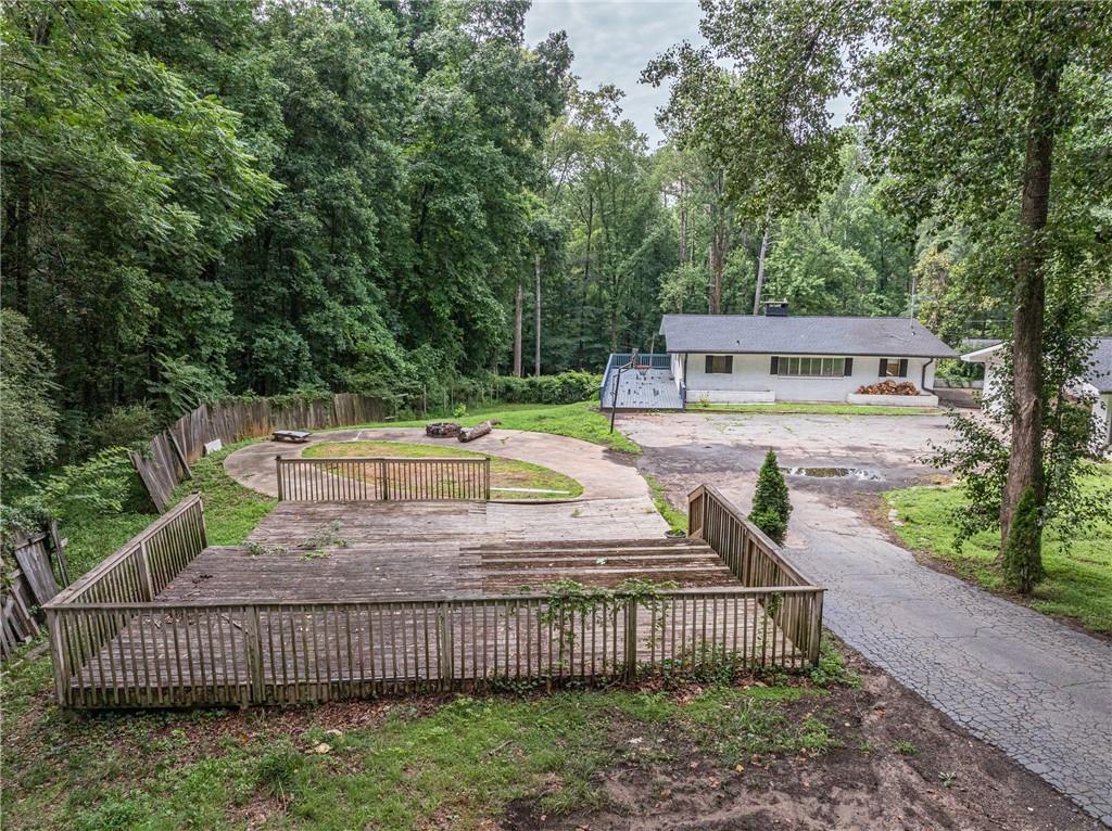 8035 Rockbridge Road Southwest Lithonia, GA 30058 - Photo 2 of 39 a view of outdoor space yard and patio