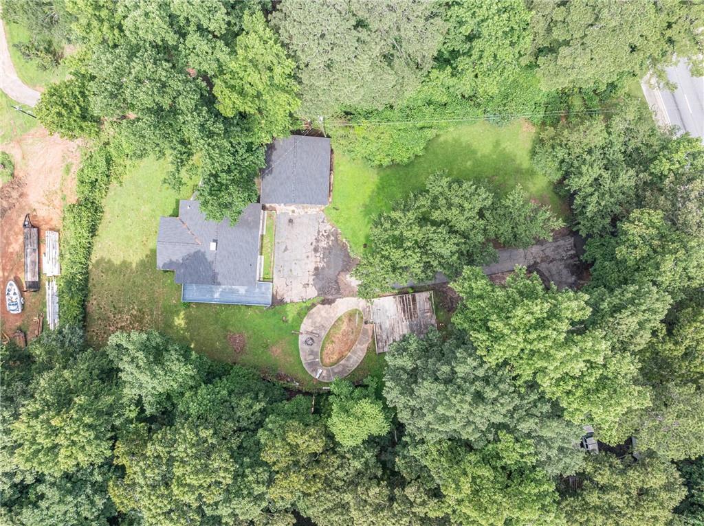8035 Rockbridge Road Southwest Lithonia, GA 30058 - Photo 29 of 39 an aerial view of a house with outdoor space and street view