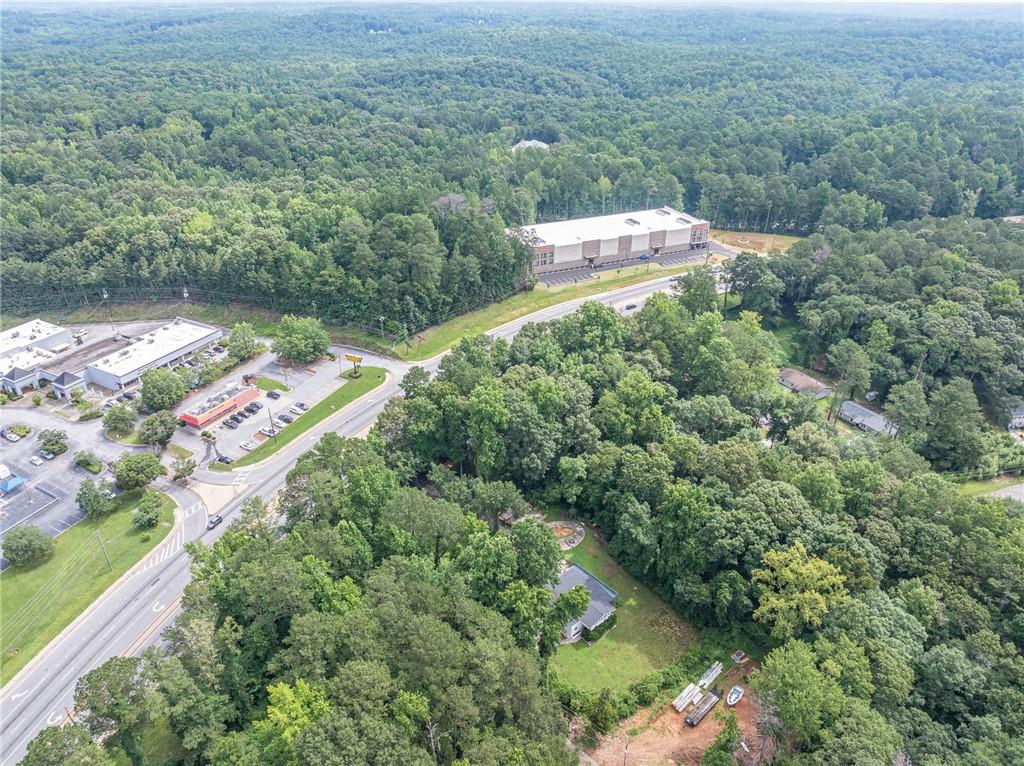 8035 Rockbridge Road Southwest Lithonia, GA 30058 - Photo 35 of 39 an aerial view of residential house with outdoor space