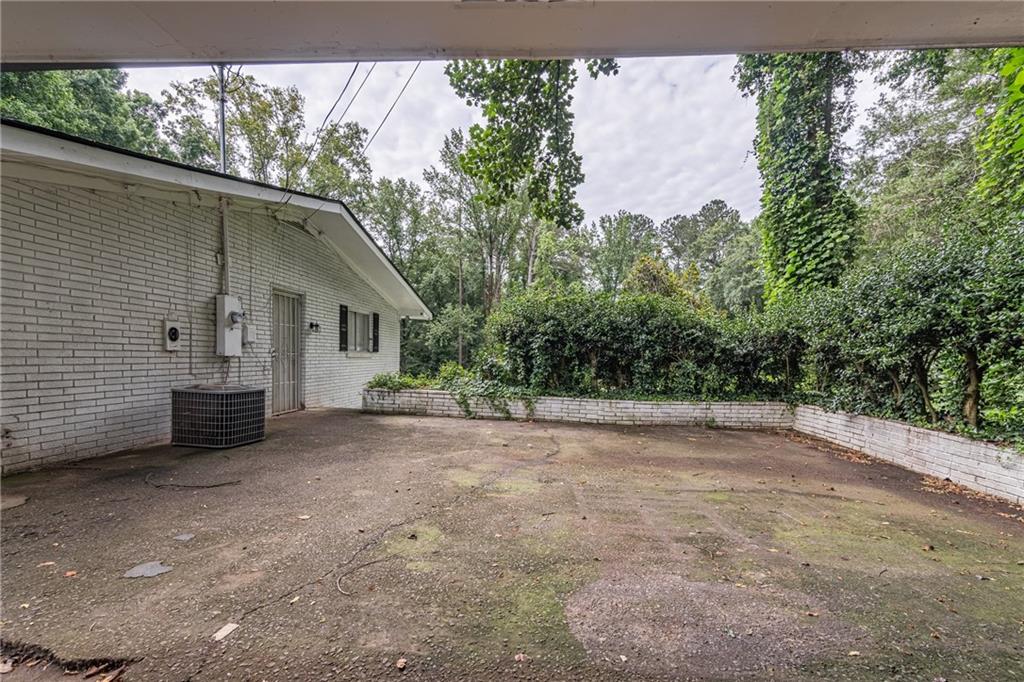 8035 Rockbridge Road Southwest Lithonia, GA 30058 - Photo 7 of 39 a view of a house with a outdoor space