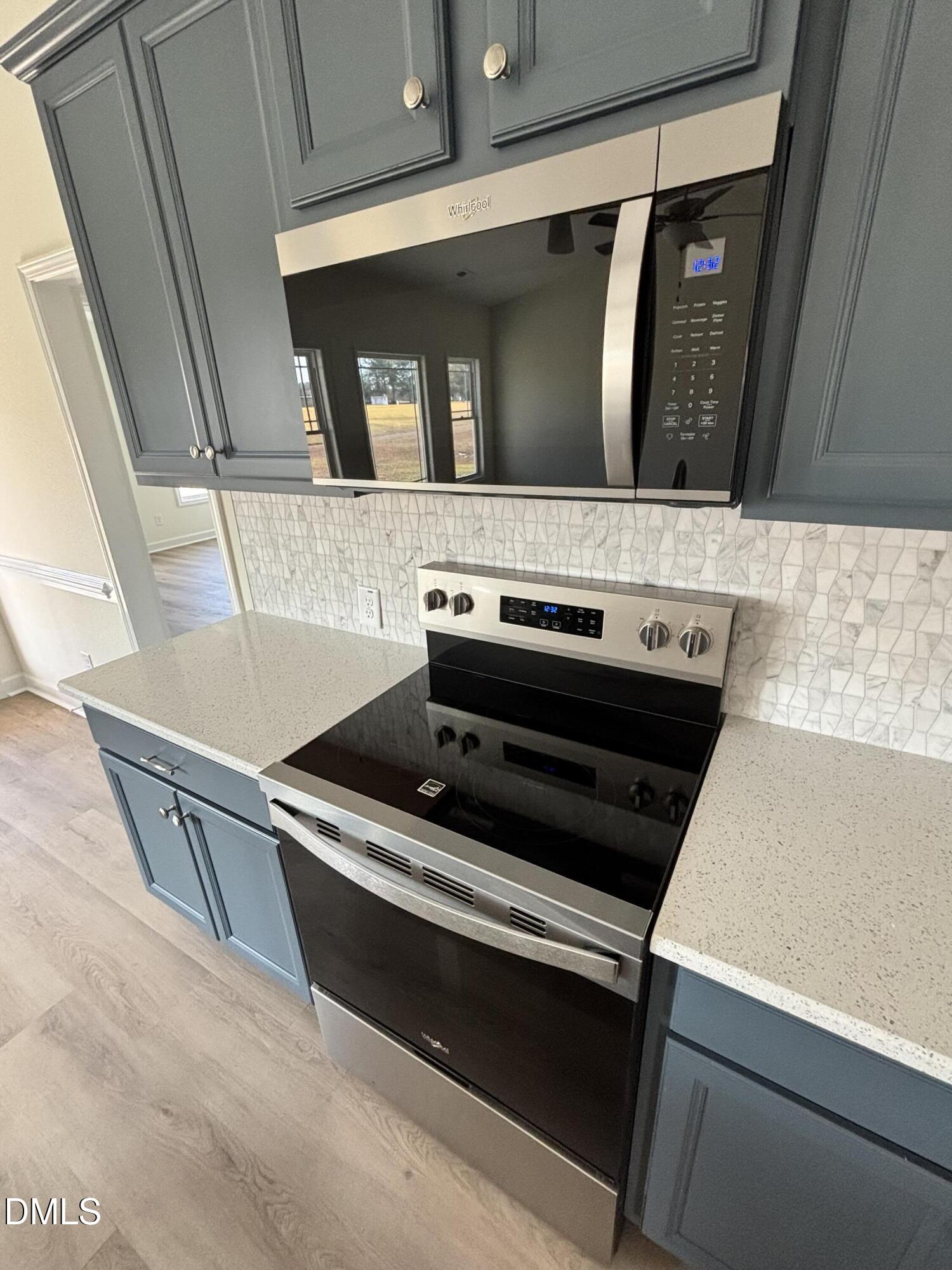 149 Budd Godwin Lane Dunn, NC 28334 - Photo 12 of 19 a living room with furniture and a flat screen tv
