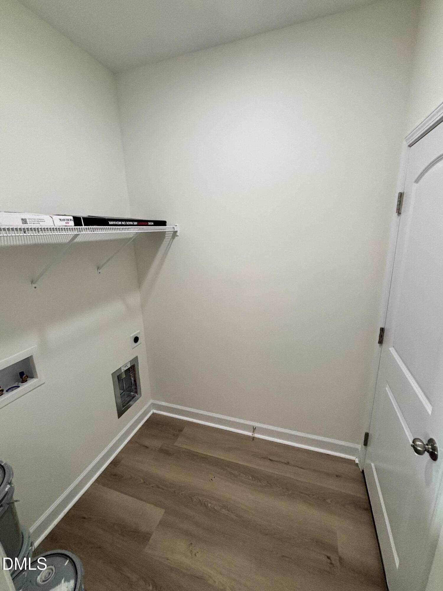 149 Budd Godwin Lane Dunn, NC 28334 - Photo 17 of 19 a view of a room with empty racks